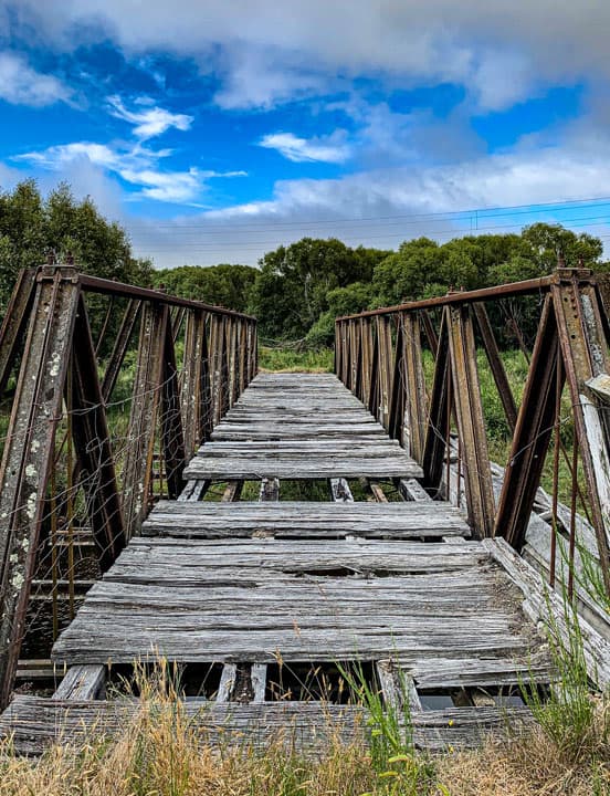 a vulnerable bridge missing planks