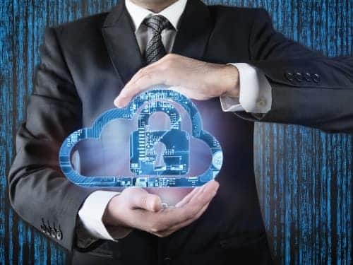 Man holding conceptualization of cloud security