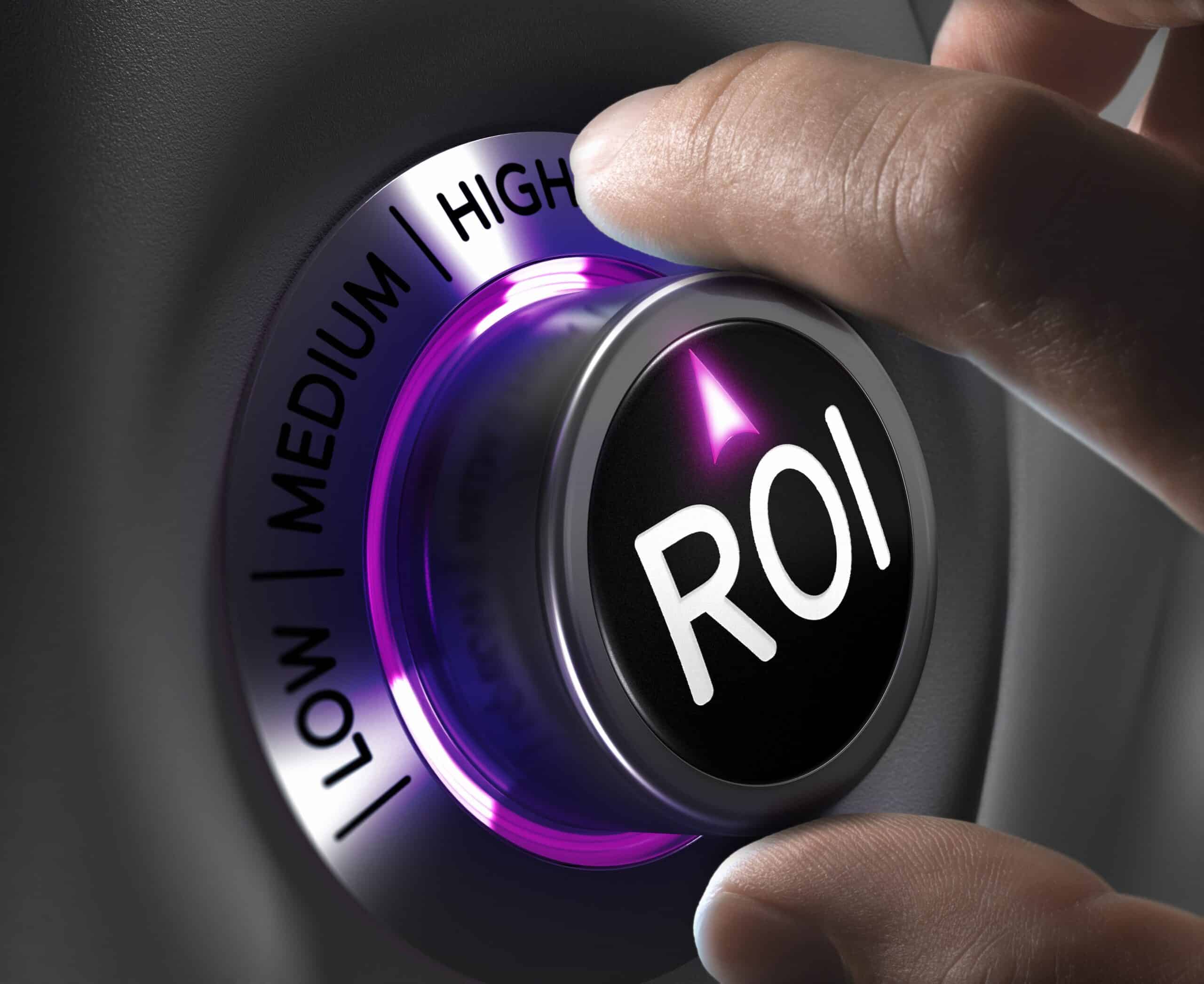 Microsoft Adoption Score ROI Concept, two fingers turning button in the highest position. Microsoft Adoption Score ROI Concept, two fingers turning button in the highest position.