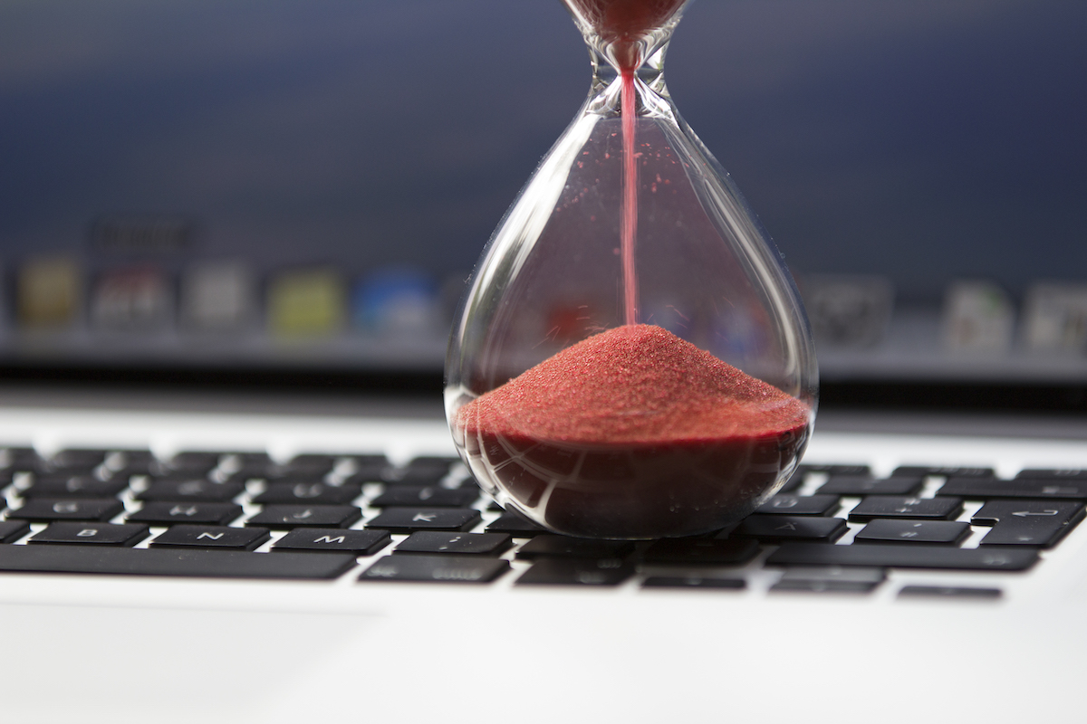 Hourglass on keyboard - waiting for Exchange Server email.