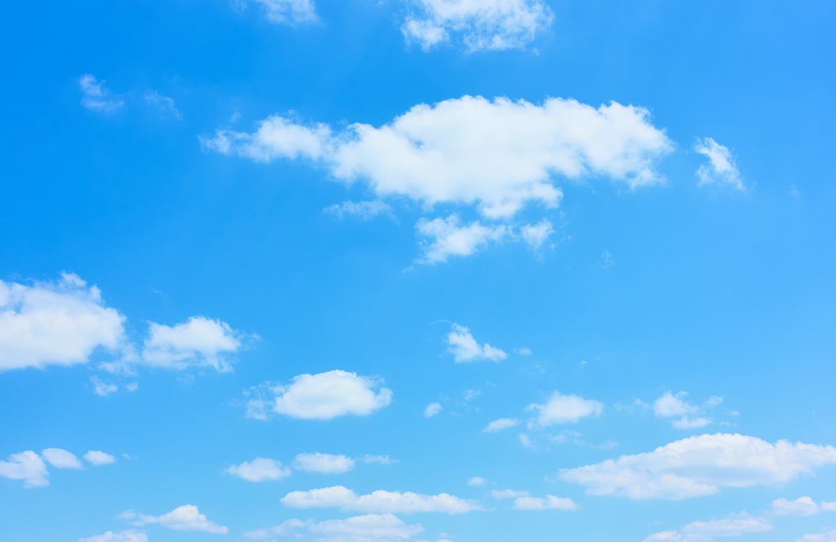 White clouds in the blue sky to represent move to the cloud with Azure Database Migration Service.