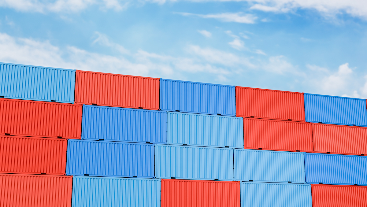 Stack of Cargo shipping in container terminal yard, show sky in color of Azure storage.